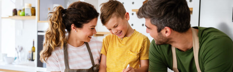woman, man and boy in kitchen